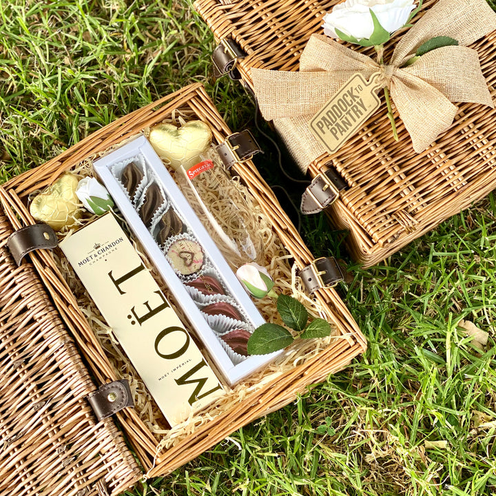 A Taste Of Romance Picnic Basket | Auckland Grocery Delivery Get A Taste Of Romance Picnic Basket delivered to your doorstep by your local Auckland grocery delivery. Shop Paddock To Pantry. Convenient online food shopping in NZ | Grocery Delivery Auckland | Grocery Delivery Nationwide | Fruit Baskets NZ | Online Food Shopping NZ Delight your Valentine with a reusable wicker picnic basket filled with romantic treats. Get FREE DELIVERY on our overnight service. Paddock To Pantry is your go-to when only the be