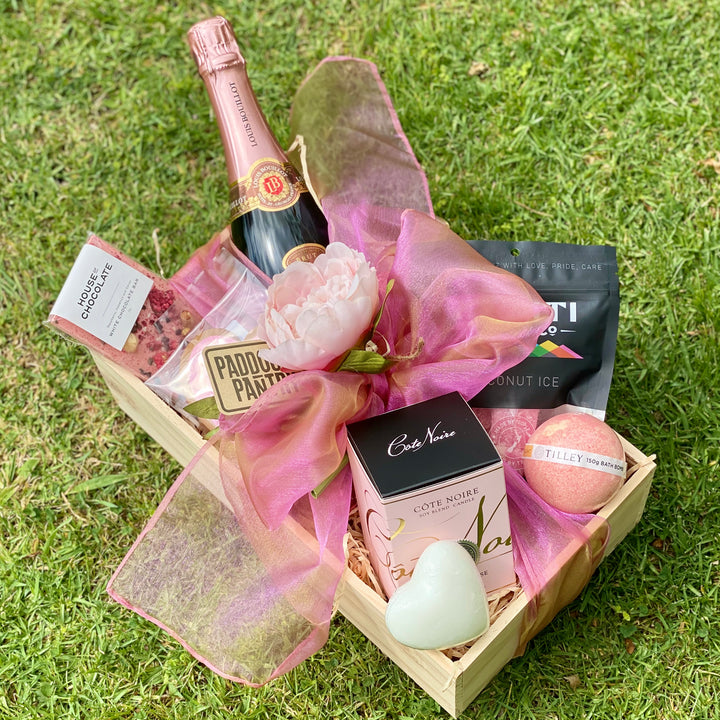 Treat Her Pink Gift Basket | Auckland Grocery Delivery Get Treat Her Pink Gift Basket delivered to your doorstep by your local Auckland grocery delivery. Shop Paddock To Pantry. Convenient online food shopping in NZ | Grocery Delivery Auckland | Grocery Delivery Nationwide | Fruit Baskets NZ | Online Food Shopping NZ Treat Her to the Gift Basket including bubbles, chocolate Cote Noire and more all presented beautifully in a sustainable gift basket. Paddock To Pantry deliver Gift Baskets, Flowers, Fruit Bask